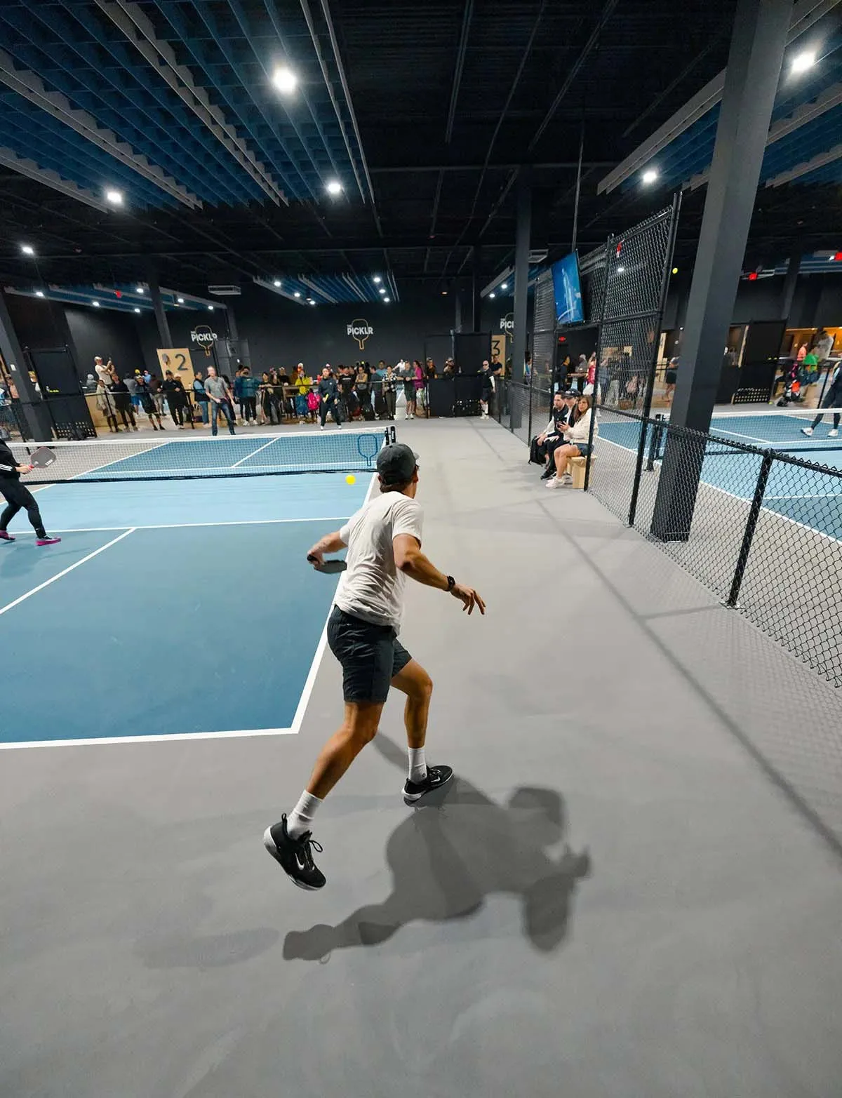 indoor playing area at The Picklr Live Oak in Live Oak, TX