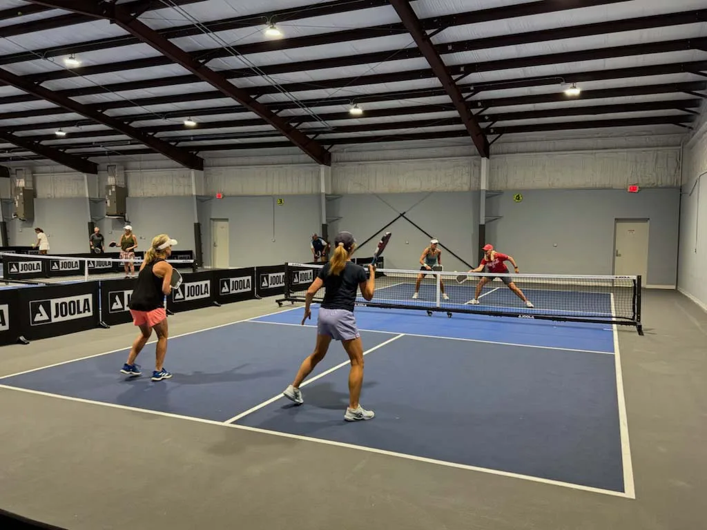players enjoying pickleball at Bayside Pickleball Club in Santa Rosa Beach, FL