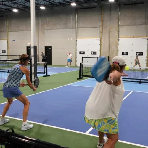 players enjoying pickleball at Pickles and Play in Wake Forest, NC