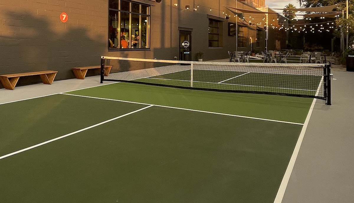 Outdoor pickleball courts at The Exchange Pickleball + Bar + Restaurant in New Orleans, LA